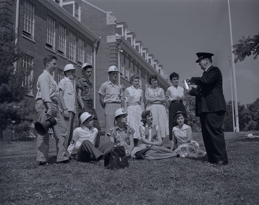 Join the Chevy Chase Historical Society for a special centennial program on Sunday, November 1, at 3 p.m. at Bethesda-Chevy Chase High School (4301 East-West Highway, Bethesda, MD) with museum exhibit developer Lucy Harvey, as she explores the remarkable history of B-CC and the milestones that have shaped its first century.  Founded in 1926 as a segregated neighborhood school on former farmland, B-CC has transformed into a diverse, urban high school serving students from 55 countries. From presidential visitors and groundbreaking nuclear disaster planning to voluntary desegregation and student exchanges with the Soviet Union, the school’s history offers a unique window into a century of change in American education. Harvey will discuss the development of the new Centennial Museum and guide visitors through the exhibit.  Harvey has developed exhibitions and digital content for institutions including the Smithsonian’s National Museum of American History and the Discovery Channel. She studied history at Dartmouth College, earned a master’s in journalism from Columbia University, and holds a certificate in Museum Studies from George Washington University.  The program is free and open to the public. Please use the doors closest to the cafeteria when entering B-CC for this event.  For more information, contact the Chevy Chase Historical Society at 301-656-6141 or info@chevychasehistory.org.  📸Unpublished photograph of the B-CC nuclear bomb drill taken during a 1954 photo shoot for the Saturday Evening Post article titled “This School is Ready for the H-bomb.” Courtesy of the Oliver Atkin Collection, 0036, Box 54, Folder 118, Image 37, Special Collections Research Center, George Mason University Libraries.